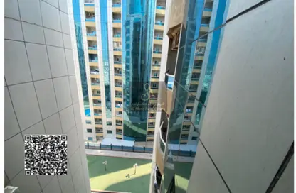شقة - غرفة نوم - 2 حمامات للايجار في أورينت تاور 1 - أورينت تاور - البستان - عجمان