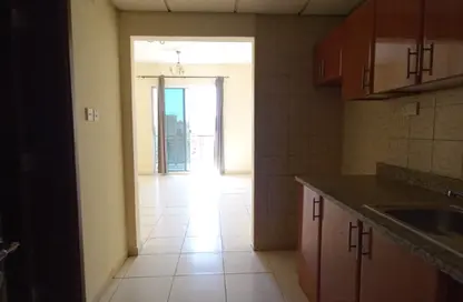 Apartment - Studio - 1 Bathroom for rent in IC1-EMR-13 - Emirates Cluster - International City - Dubai