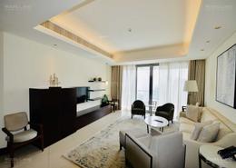 صورةغرفة المعيشة لـ: النزل و الشقق الفندقية - 2 غرف نوم - 3 حمامات للبيع في فندق العنوان داونتاون - دبي وسط المدينة - دبي, صورة 1
