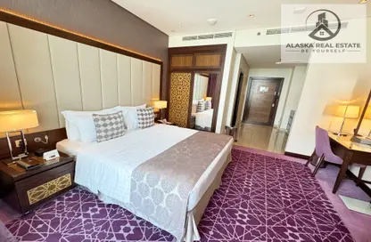 Apartment - Studio - 1 Bathroom for rent in Royal Continental Suites - Business Bay - Dubai