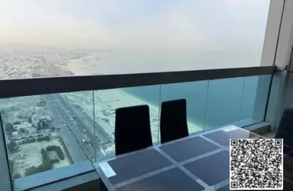 Apartment - 1 Bedroom - 2 Bathrooms for rent in Corniche Tower - Ajman Corniche Road - Ajman