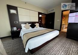 صورةغرفة- غرفة النوم لـ: النزل و الشقق الفندقية - 2 حمامات للبيع في لاجونا موفنبيك - بحيرة اللور - أبراج بحيرة الجميرا - دبي, صورة 1