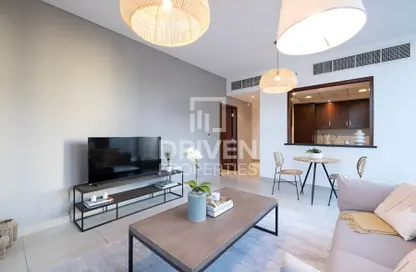 Living / Dining Room image for: Apartment - 2 Bedrooms - 2 Bathrooms for sale in 29 Burj Boulevard Tower 1 - 29 Burj Boulevard - Downtown Dubai - Dubai, Image 1