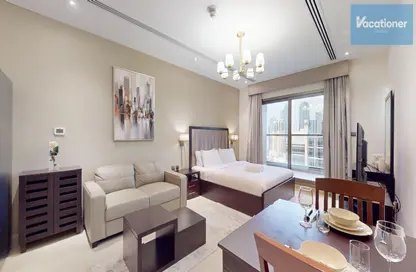 صورة لـ غرفة المعيشة / غرفة الطعام شقة - 1 حمام للايجار في برج ايليت ريزيدينس - دبي وسط المدينة - دبي ، صورة رقم 1