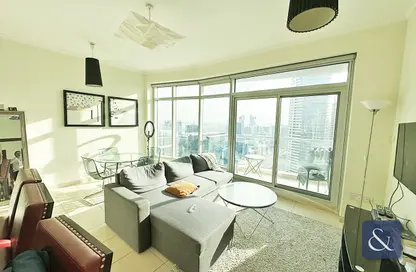 Living Room image for: Apartment - 1 Bedroom - 2 Bathrooms for rent in Burj Views A - Burj Views - Downtown Dubai - Dubai, Image 1