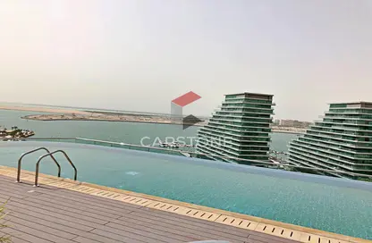 صورة لـ حوض سباحة شقة - 1 حمام للبيع في الهديل - البندر - شاطئ الراحة - أبوظبي ، صورة رقم 1