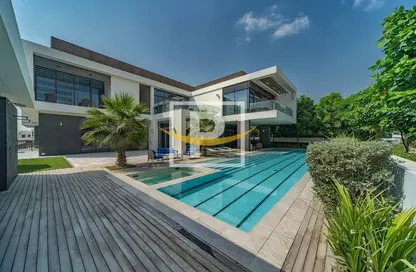 صورة لـ حوض سباحة فيلا - 7 غرف نوم للبيع في قصور ديستريكت وان - المنطقة وان - مدينة الشيخ محمد بن راشد - دبي ، صورة رقم 1