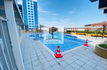 Apartment - 1 Bedroom - 2 Bathrooms for rent in Jamal Tower - Al Nahyan Camp - Abu Dhabi