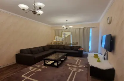 Living Room image for: Apartment - 1 Bedroom - 1 Bathroom for rent in Mandarin Towers - Garden City - Ajman, Image 1