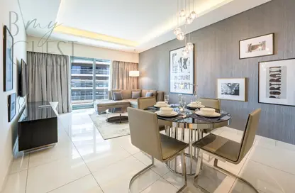 Living / Dining Room image for: Apartment - 1 Bedroom - 2 Bathrooms for rent in Tower B - DAMAC Towers by Paramount - Business Bay - Dubai, Image 1