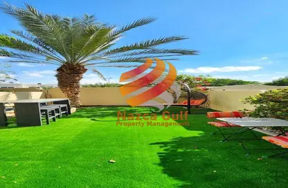 Garden image for: Villa - 2 Bedrooms - 3 Bathrooms for rent in Arabian Style - Al Reef Villas - Al Reef - Abu Dhabi, Image 1