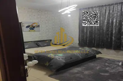 شقة - غرفة نوم - 2 حمامات للبيع في أورينت تاور 1 - أورينت تاور - البستان - عجمان