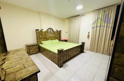 Room / Bedroom image for: Apartment - 2 Bedrooms - 2 Bathrooms for rent in Sheikh Jaber Al Sabah Street - Al Naimiya - Al Nuaimiya - Ajman, Image 1