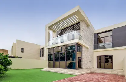 Outdoor House image for: Townhouse - 5 Bedrooms - 5 Bathrooms for rent in Queens Meadow - DAMAC Hills - Dubai, Image 1