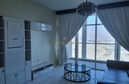 صورة لـ غرفة المعيشة شقة - 1 حمام للايجار في بيز من دانوب - الخليج التجاري - دبي ، صورة رقم 1