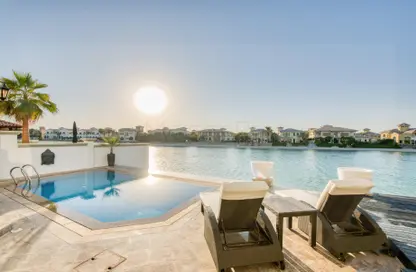 Pool image for: Villa - 5 Bedrooms - 5 Bathrooms for rent in Frond D - Garden Homes - Palm Jebel Ali - Dubai, Image 1