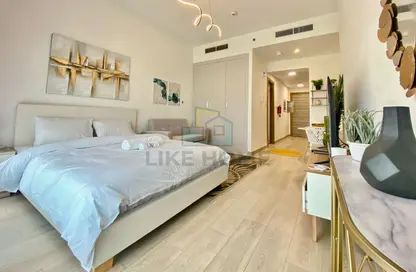 Room / Bedroom image for: Apartment - 1 Bathroom for rent in Bloom Towers - Jumeirah Village Circle - Dubai, Image 1