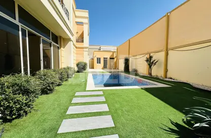 Pool image for: Villa - 6 Bedrooms for rent in Khalifa City A - Khalifa City - Abu Dhabi, Image 1