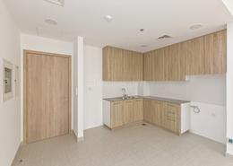 Kitchen image for: Apartment - 2 bedrooms - 2 bathrooms for sale in Rawda Apartments 2 - Rawda Apartments - Town Square - Dubai, Image 1