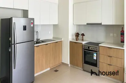 Kitchen image for: Apartment - 2 Bedrooms - 3 Bathrooms for rent in Golf Views - EMAAR South - Dubai South (Dubai World Central) - Dubai, Image 1