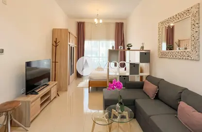 Living Room image for: Apartment - 1 Bathroom for rent in Botanica - Jumeirah Village Circle - Dubai, Image 1