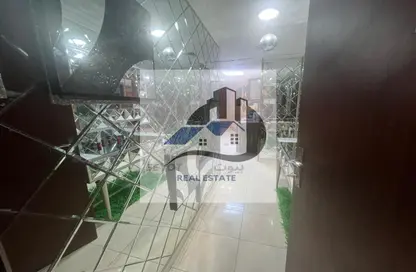 شقة - غرفة نوم - 2 حمامات للايجار في أورينت تاور 1 - أورينت تاور - البستان - عجمان