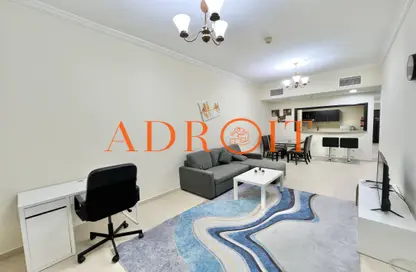 Living Room image for: Apartment - 1 Bedroom - 1 Bathroom for sale in Mazaya 31 - Queue Point - Dubai Land - Dubai, Image 1