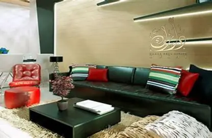 صورة لـ غرفة المعيشة شقة - غرفة نوم - 2 حمامات للبيع في برج ريجينا - قرية الجميرا سركل - دبي ، صورة رقم 1