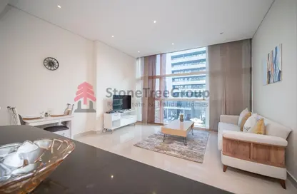 Living Room image for: Apartment - 1 Bedroom - 1 Bathroom for rent in Yacht Bay - Dubai Marina - Dubai, Image 1
