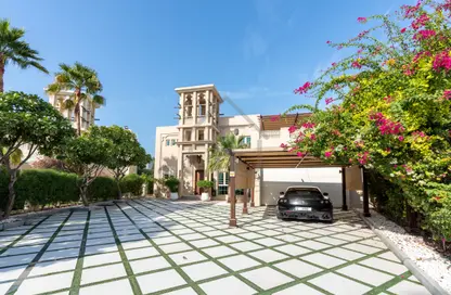 Outdoor Building image for: Villa - 4 Bedrooms - 4 Bathrooms for sale in Entertainment Foyer - Oasis Clusters - Jumeirah Islands - Dubai, Image 1