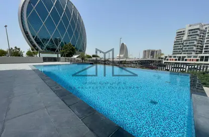 Pool image for: Apartment - 3 Bedrooms - 4 Bathrooms for rent in P1186 - Al Raha Beach - Abu Dhabi, Image 1