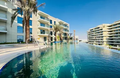 Pool image for: Apartment - 2 Bedrooms - 3 Bathrooms for rent in Al Zeina - Al Raha Beach - Abu Dhabi, Image 1