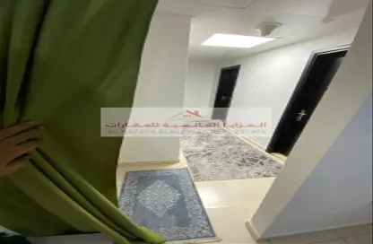 شقة - 2 غرف نوم - 2 حمامات للايجار في الممزر بلازا - شارع التعاون - التعاون - الشارقة