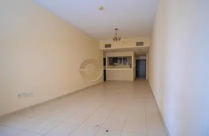 Empty Room image for: Apartment - 1 Bedroom - 2 Bathrooms for rent in Mazaya 29 - Queue Point - Dubai Land - Dubai, Image 1
