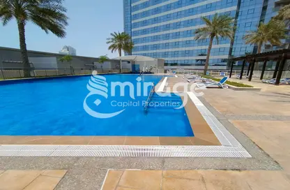 صورة لـ حوض سباحة شقة - 2 غرف نوم - 3 حمامات للبيع في أبراج سيجما - مدينة الأضواء - جزيرة الريم - أبوظبي ، صورة رقم 1