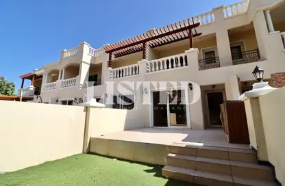 Outdoor House image for: Villa - 2 Bedrooms - 2 Bathrooms for rent in The Townhouses at Al Hamra Village - Al Hamra Village - Ras Al Khaimah, Image 1