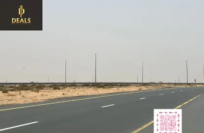 أرض - استوديو للبيع في روضة القرط - ضاحية الروضات - الشارقة