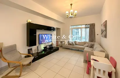 Living Room image for: Apartment - 2 Bedrooms - 3 Bathrooms for sale in Glitz 3 - Glitz - Dubai Studio City - Dubai, Image 1