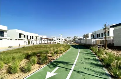 Outdoor Building image for: Townhouse - 3 Bedrooms - 4 Bathrooms for sale in Aspens - Yas Acres - Yas Island - Abu Dhabi, Image 1