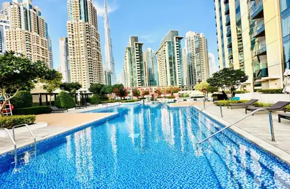 Pool image for: Apartment - 3 Bedrooms - 4 Bathrooms for rent in Vida Residence Downtown - Downtown Dubai - Dubai, Image 1