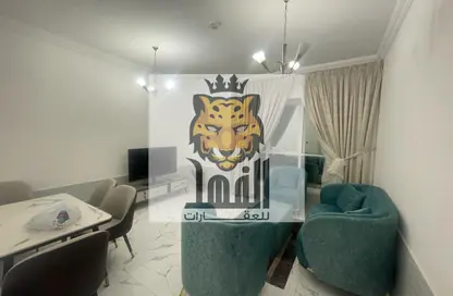 شقة - غرفة نوم - 2 حمامات للايجار في أورينت تاور 1 - أورينت تاور - البستان - عجمان