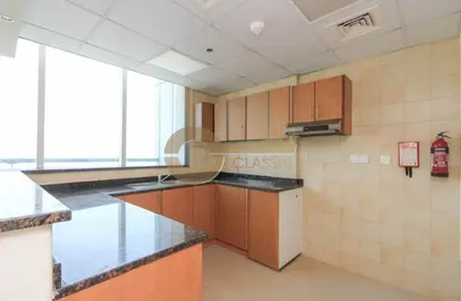 Apartment - 1 Bedroom - 2 Bathrooms for sale in Cricket Tower - Dubai Sports City - Dubai