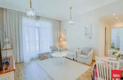 Living Room image for: Apartment - 1 Bedroom - 2 Bathrooms for sale in Mazaya 22 - Queue Point - Dubai Land - Dubai, Image 1