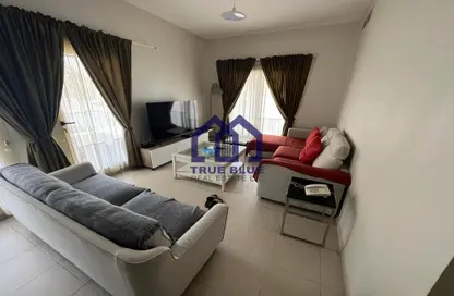 Living Room image for: Apartment - 1 Bedroom - 2 Bathrooms for rent in Golf Apartments - Al Hamra Village - Ras Al Khaimah, Image 1