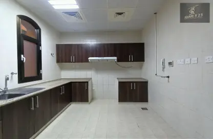 Kitchen image for: Apartment - 1 Bedroom - 1 Bathroom for rent in Ministries Complex - Khalifa Park - Eastern Road - Abu Dhabi, Image 1
