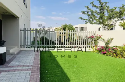 Garden image for: Villa - 3 Bedrooms - 4 Bathrooms for rent in Aurum Villas - Odora - Damac Hills 2 - Dubai, Image 1