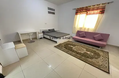 Living Room image for: Apartment - 1 Bathroom for rent in C2302 - Khalifa City A - Khalifa City - Abu Dhabi, Image 1
