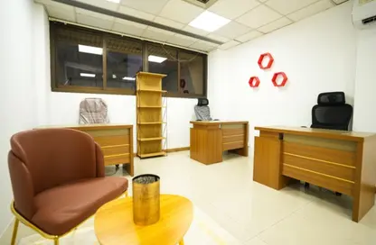 Business Centre - Studio - 2 Bathrooms for rent in Al Rais Building - Al Karama - Dubai