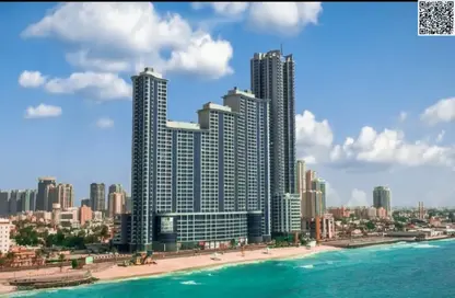 Apartment - 1 Bedroom - 2 Bathrooms for sale in Corniche Tower - Ajman Corniche Road - Ajman