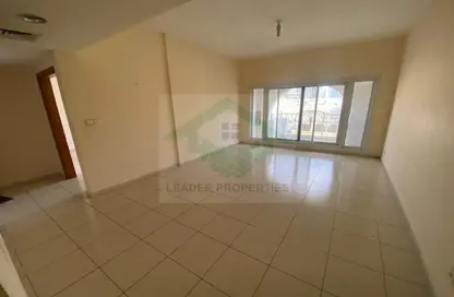 Empty Room image for: Apartment - 1 Bedroom - 2 Bathrooms for sale in Emirates Gardens 1 - Jumeirah Village Circle - Dubai, Image 1